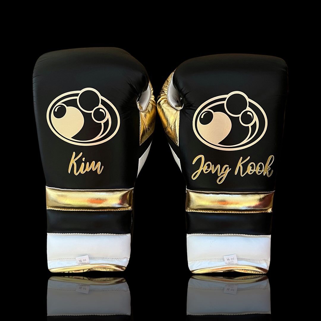 Grant Boxing Gloves in Black/White/Gold colorway - Professional Lace-Up training gloves