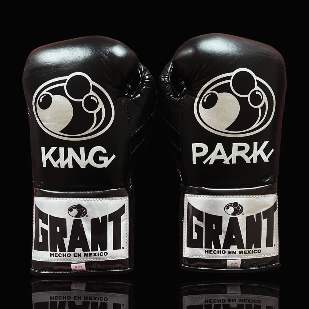 Grant Boxing Gloves in Black colorway - Professional Lace-Up training gloves