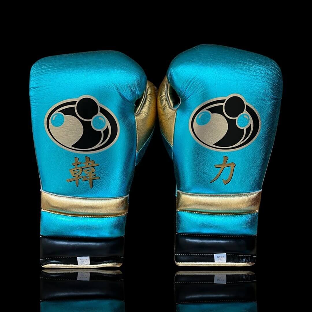 Grant Boxing Gloves in Blue/Black/Gold colorway - Professional Lace-Up training gloves