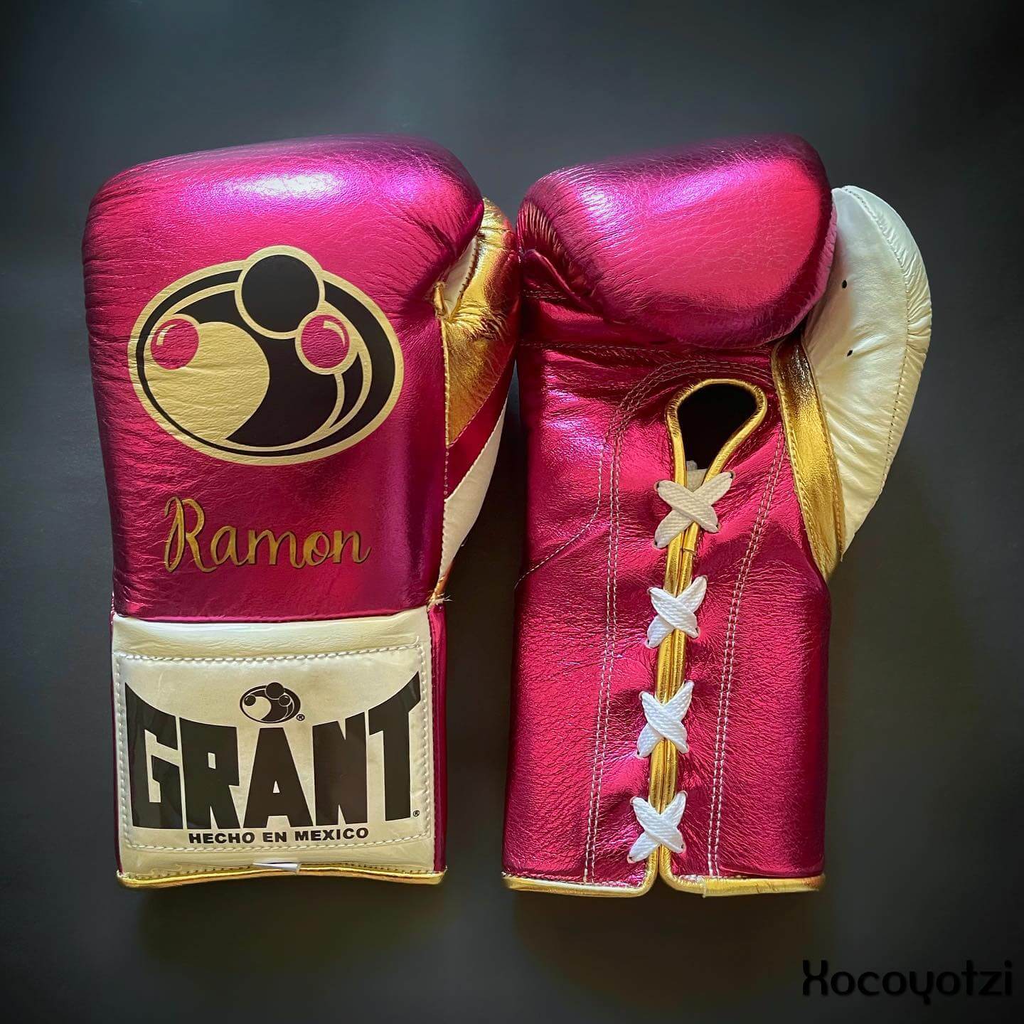 Grant Boxing Gloves in Pink/Gold/White colorway - Professional Lace-Up training gloves