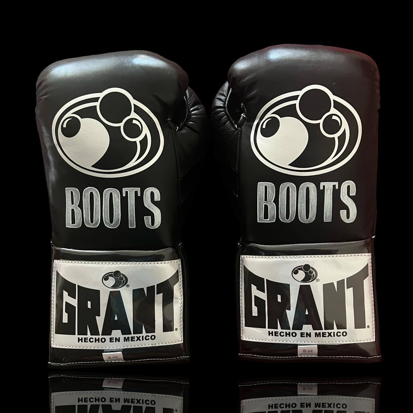 Grant Boxing Gloves in Black colorway - Professional Lace-Up training gloves