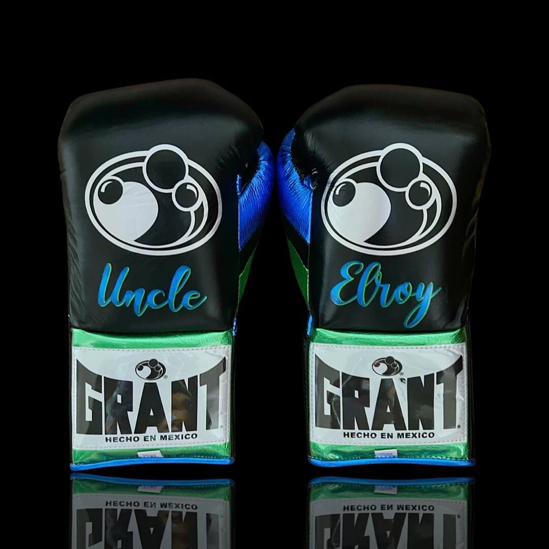Grant Boxing Gloves in Black/Blue/Green colorway - Professional Lace-Up training gloves