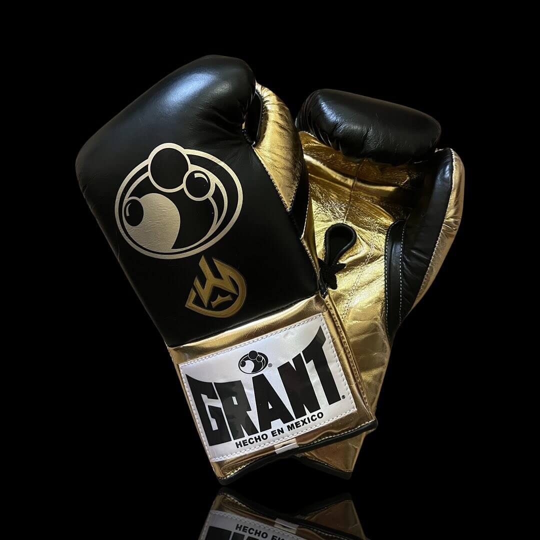 Grant Boxing Gloves in Black/Gold colorway - Professional Lace-Up training gloves