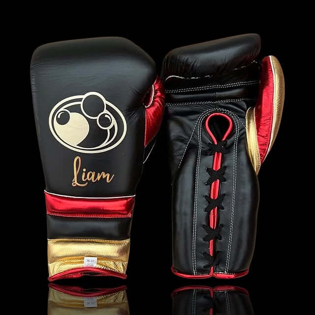 Grant Boxing Gloves in Black/Red/Gold colorway - Professional Lace-Up training gloves