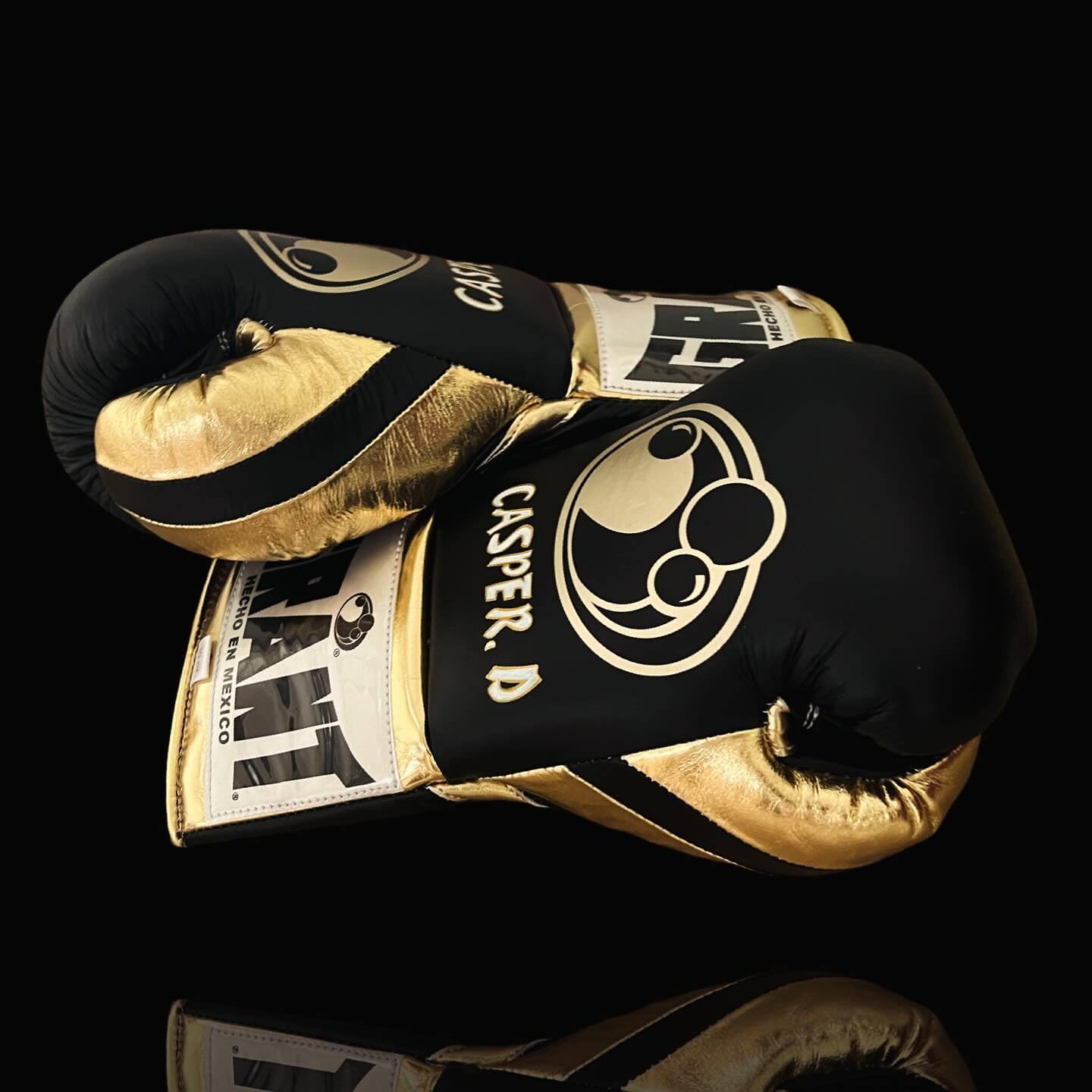Grant Boxing Gloves in Black/Gold colorway - Professional Lace-Up training gloves