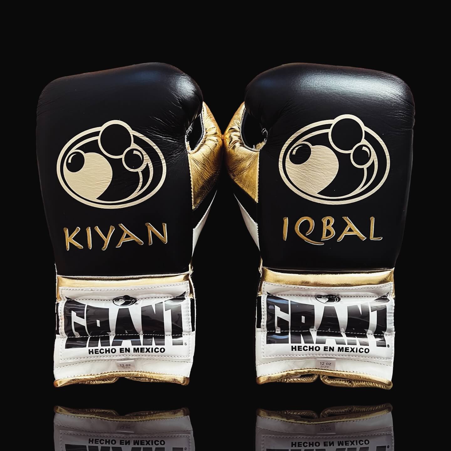 Grant Boxing Gloves in Black/Gold/White colorway - Professional Lace-Up training gloves