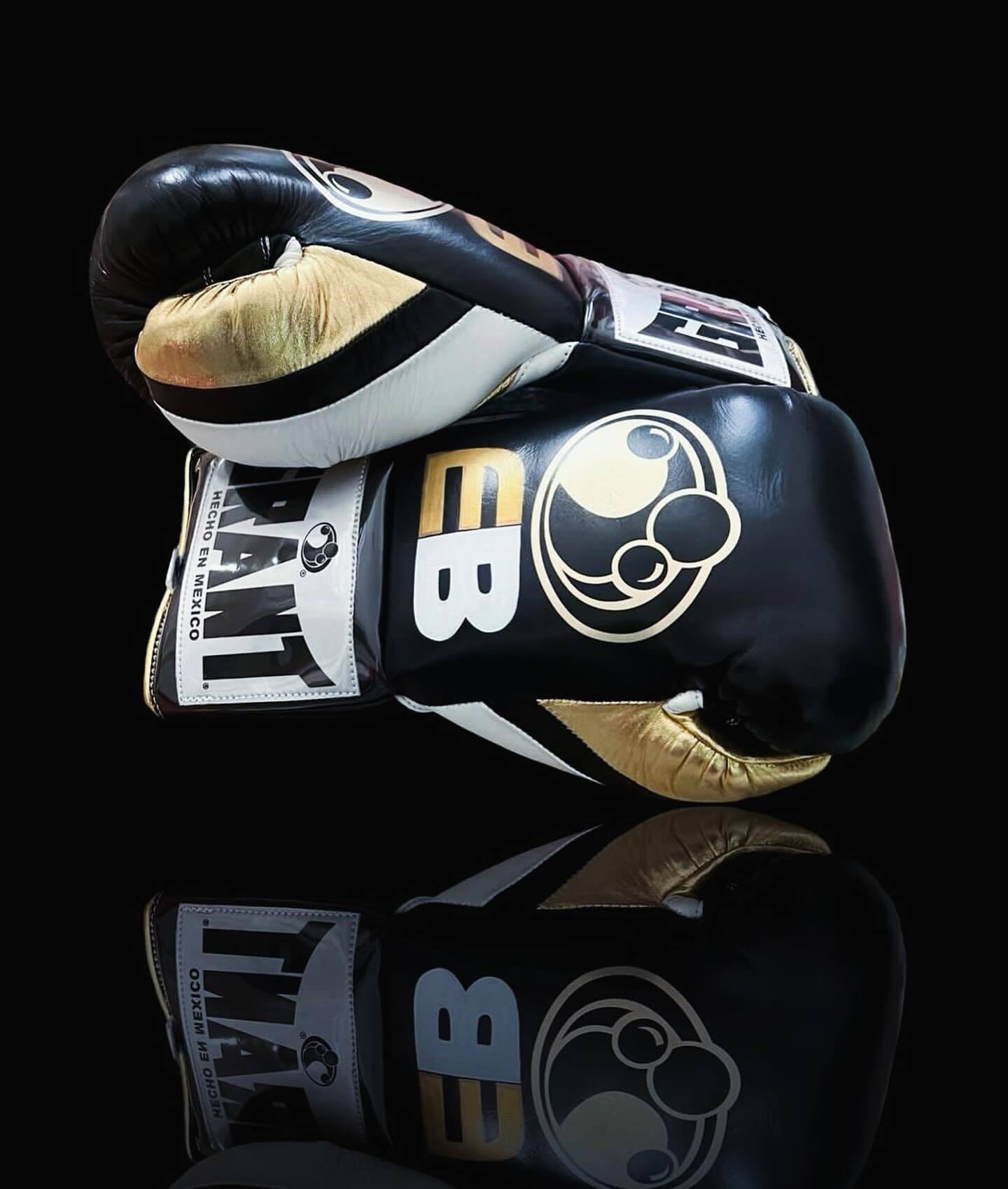 Grant Boxing Gloves in Black/Gold colorway - Professional Lace-Up training gloves