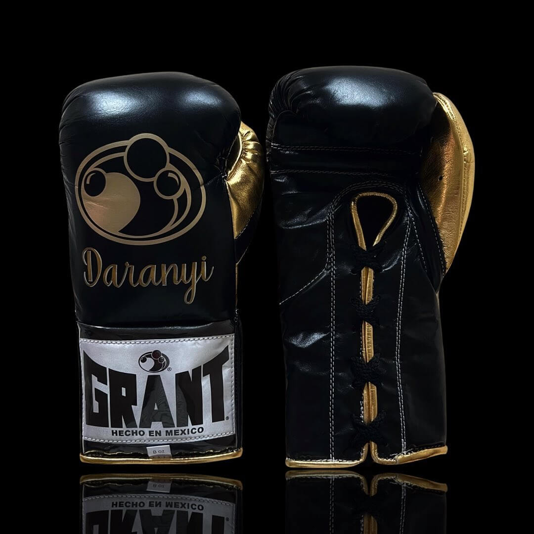 Grant Boxing Gloves in Black/Gold colorway - Professional Lace-Up training gloves