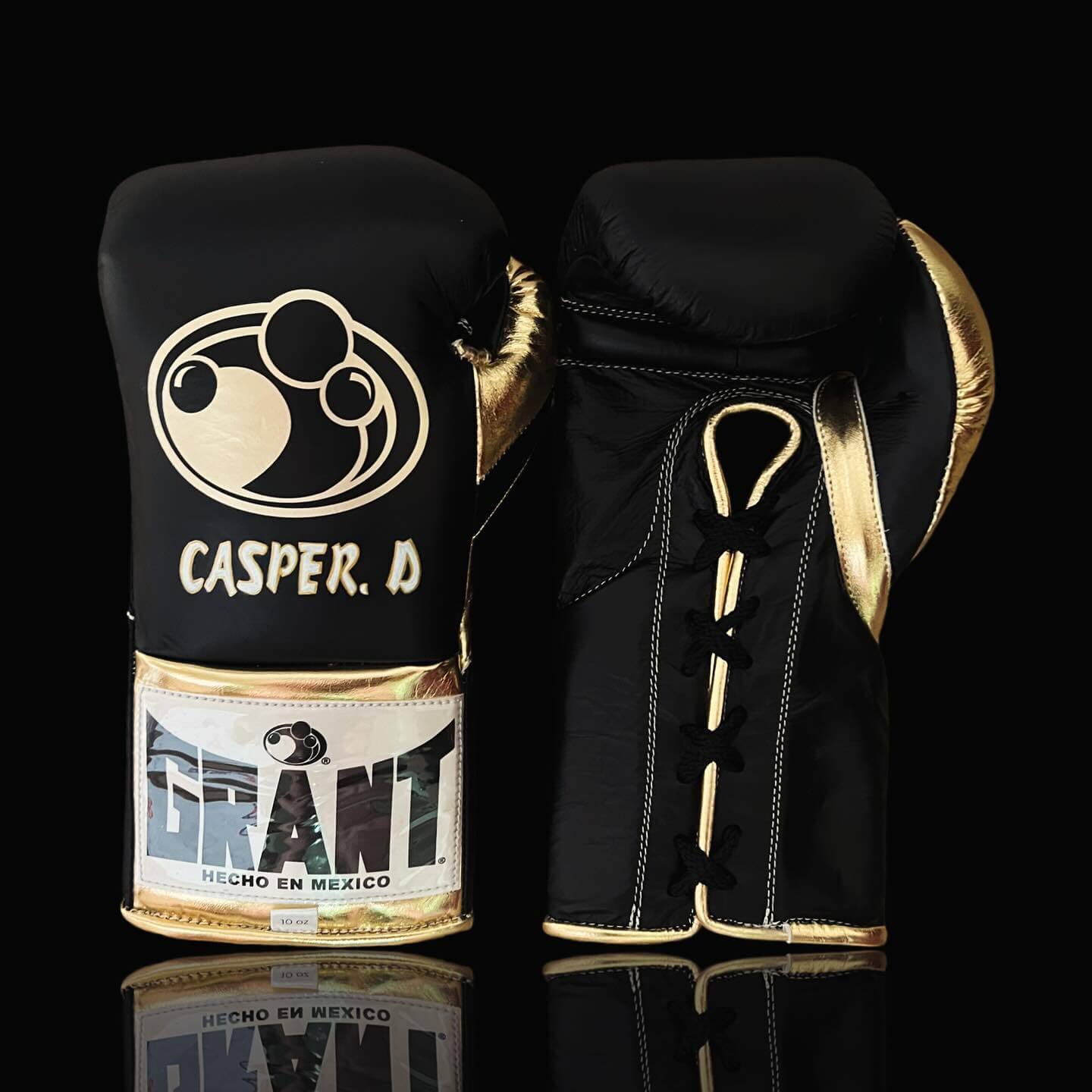 Grant Boxing Gloves in Black/Gold colorway - Professional Lace-Up training gloves