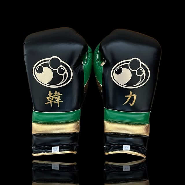 Grant Boxing Gloves in Black/Green/Gold colorway - Professional Lace-Up training gloves
