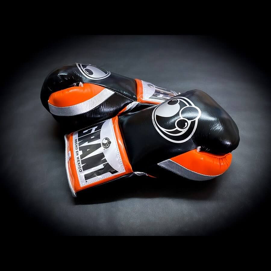 Grant Boxing Gloves in Black/Red/White colorway - Professional Lace-Up training gloves
