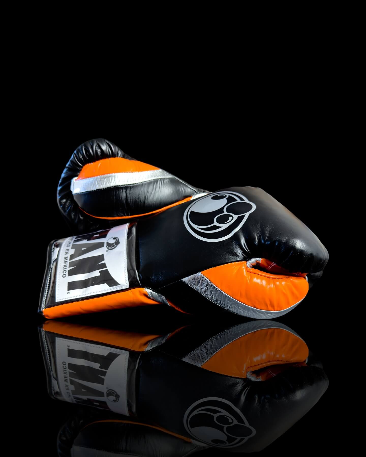 Grant Boxing Gloves in Black/Orange/Silver colorway - Professional Lace-Up training gloves