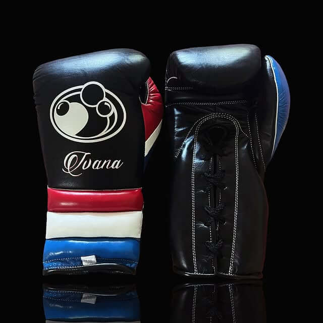 Grant Boxing Gloves in Black/Red/White/Blue colorway - Professional Lace-Up training gloves