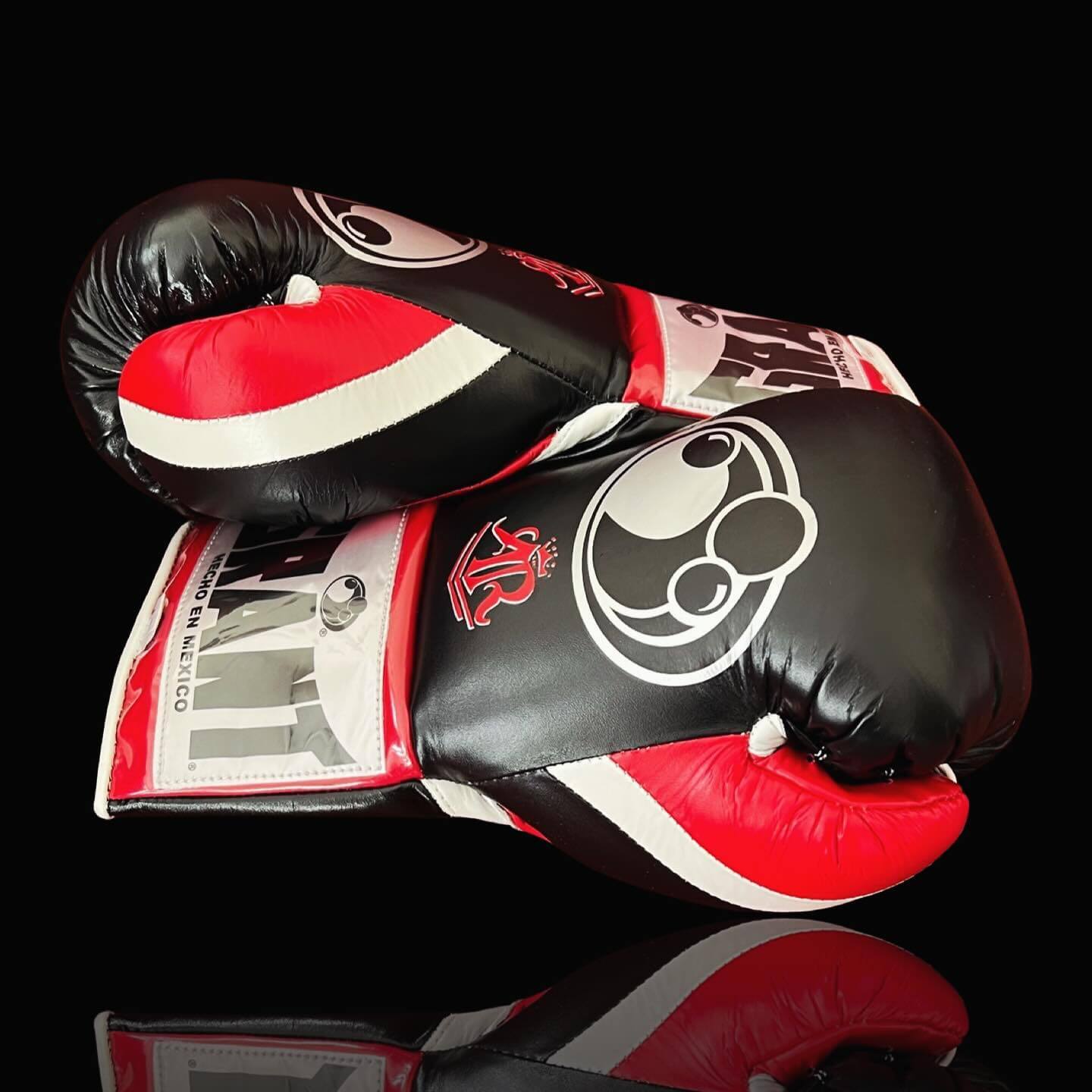 Grant Boxing Gloves in Black/Red/White colorway - Professional Lace-Up training gloves