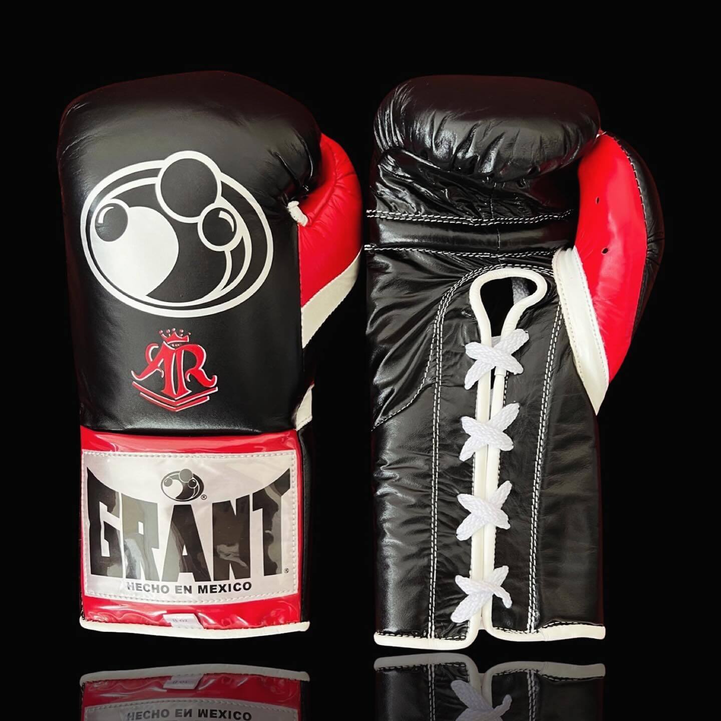 Grant Boxing Gloves in Black/Red/White colorway - Professional Lace-Up training gloves