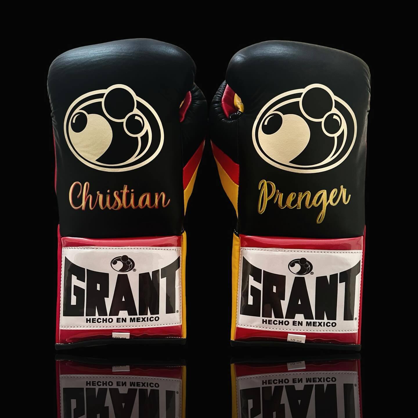 Grant Boxing Gloves in Black/Red/Yellow colorway - Professional Lace-Up training gloves