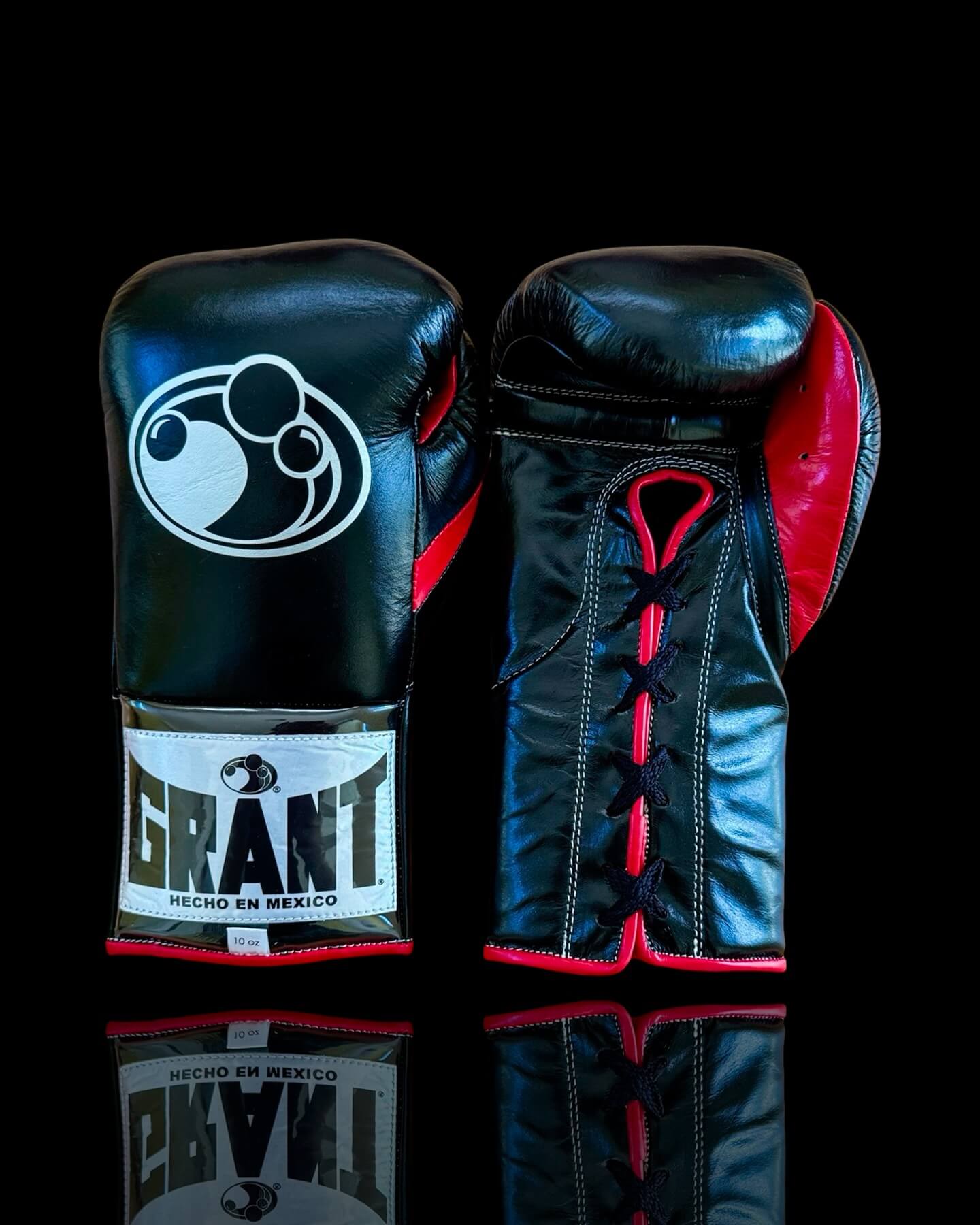 Grant Boxing Gloves in Black/Red colorway - Professional Lace-Up training gloves