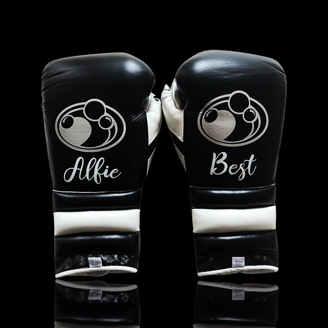 Grant Boxing Gloves in Black/White/Silver colorway - Professional Lace-Up training gloves