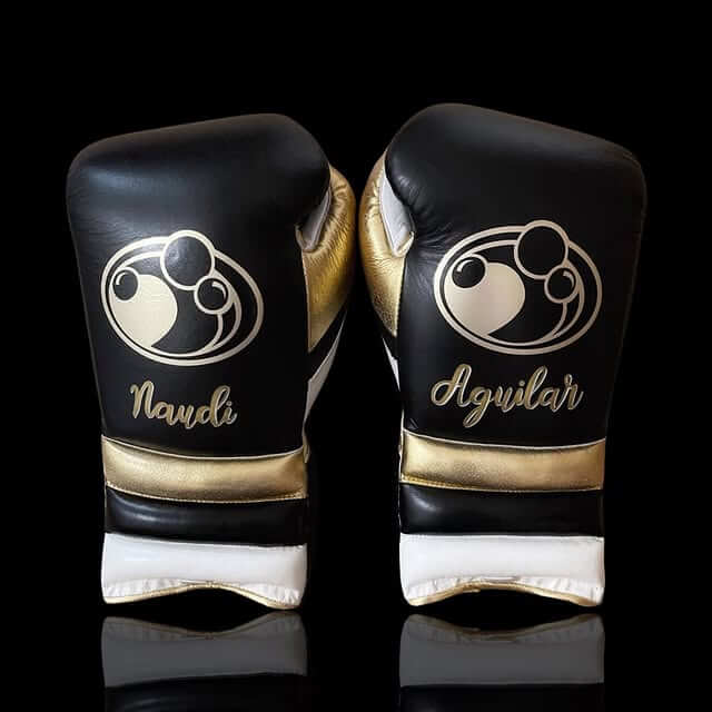 Grant Boxing Gloves in Black/Gold/White colorway - Professional Lace-Up training gloves