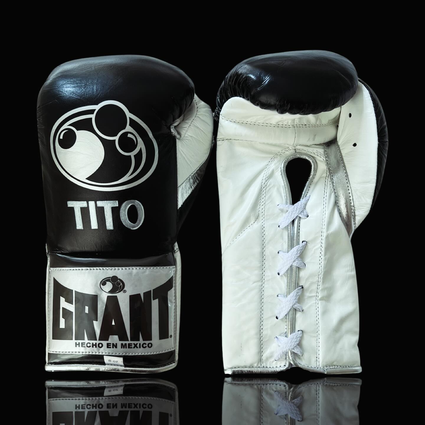 Grant Boxing Gloves in Black/White/Silver colorway - Professional Lace-Up training gloves