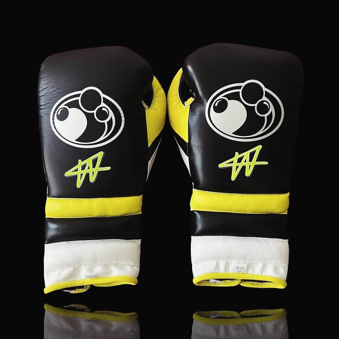 Grant Boxing Gloves in Black/Yellow/White colorway - Professional Lace-Up training gloves