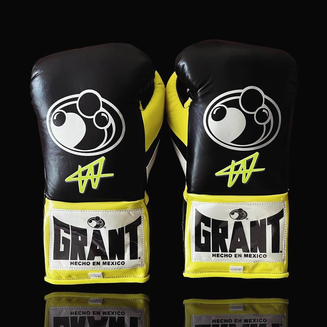 Grant Boxing Gloves in Black/Yellow/White colorway - Professional Lace-Up training gloves