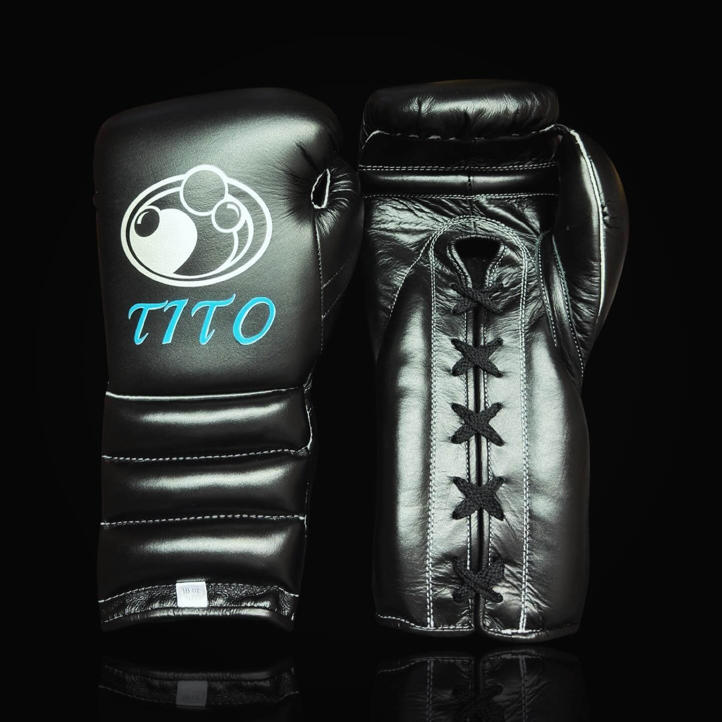 Grant Boxing Gloves in Black/Blue colorway - Professional Lace-Up training gloves