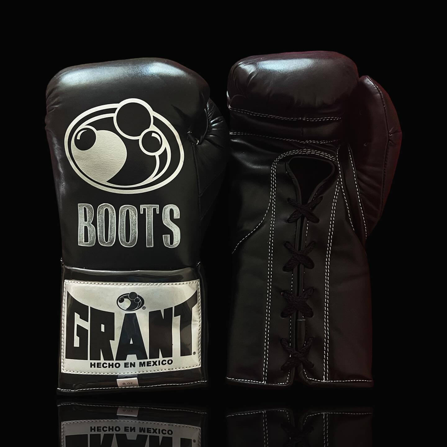 Grant Boxing Gloves in Black colorway - Professional Lace-Up training gloves