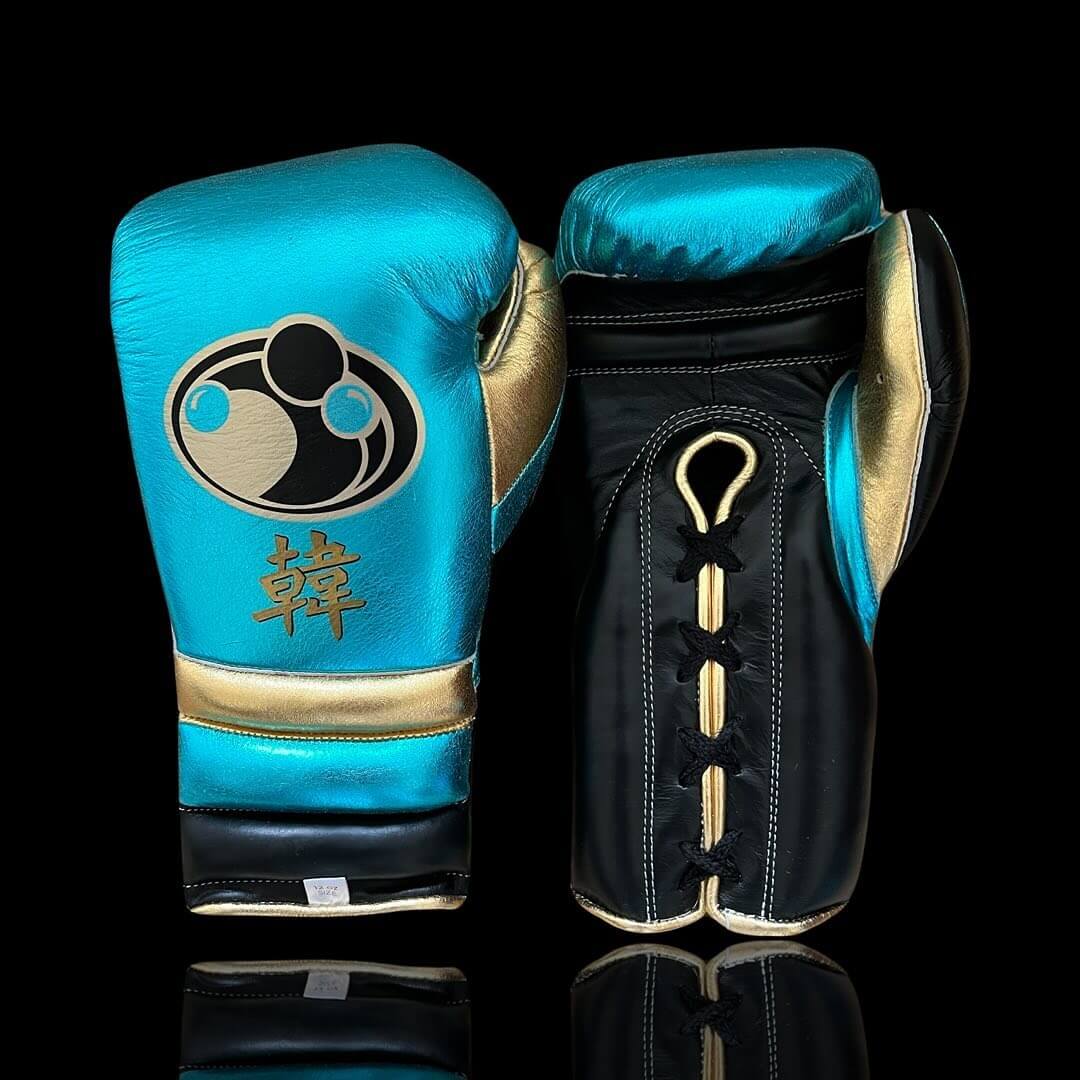 Grant Boxing Gloves in Blue/Black/Gold colorway - Professional Lace-Up training gloves