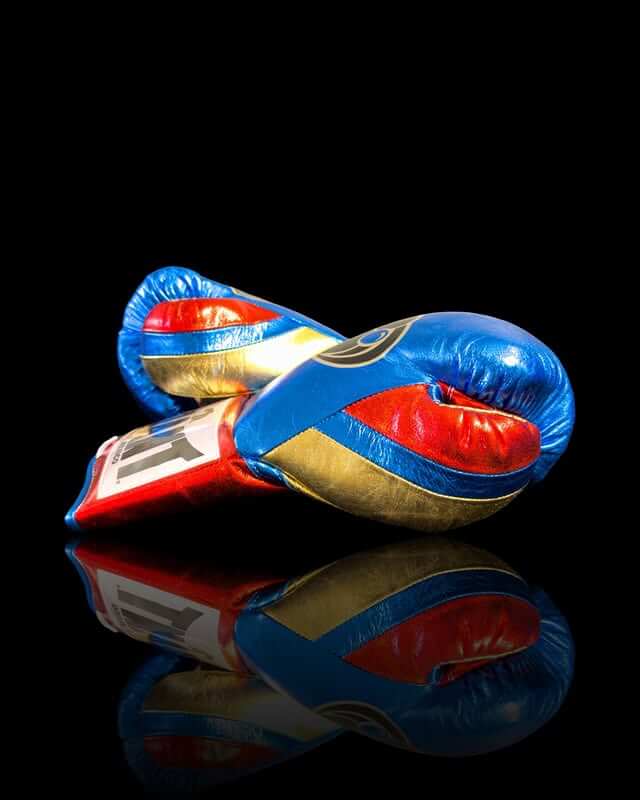 Grant Boxing Gloves in Blue/Gold/Red colorway - Professional Lace-Up training gloves