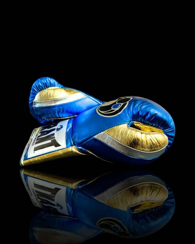 Grant Boxing Gloves in Blue/Gold colorway - Professional Lace-Up training gloves