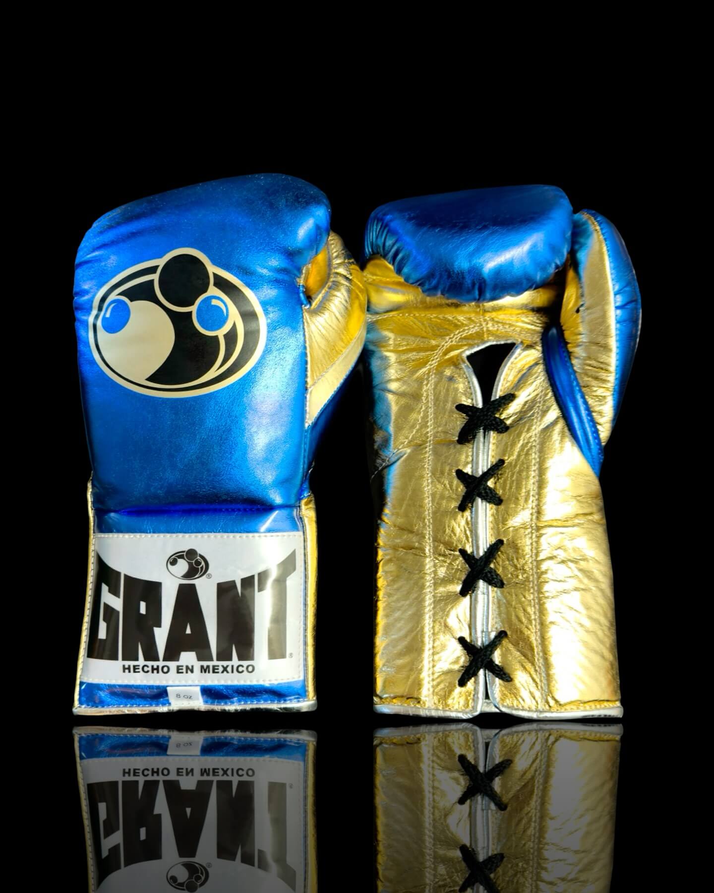 Grant Boxing Gloves in Blue/Gold colorway - Professional Lace-Up training gloves