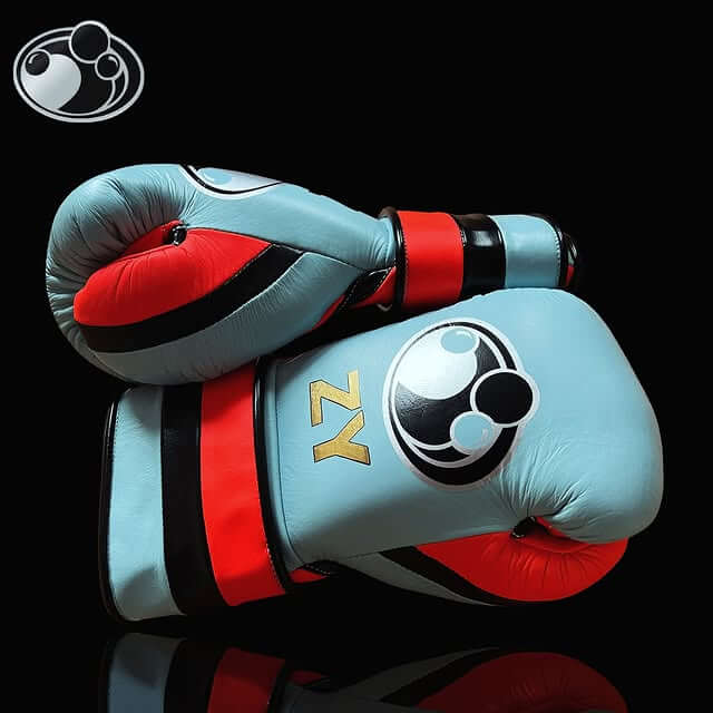 Grant Boxing Gloves in Blue/Orange/Black colorway - Professional Lace-Up training gloves
