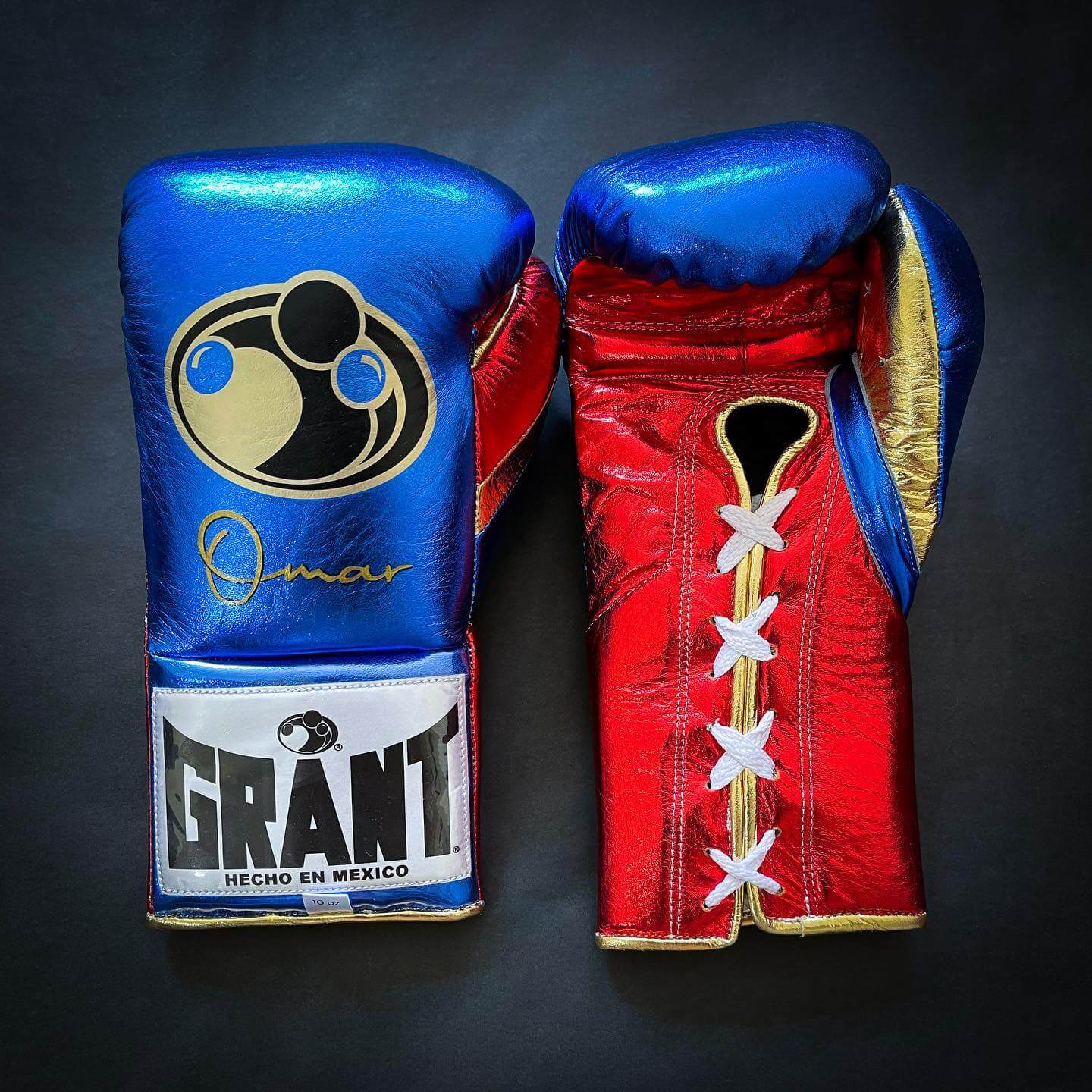 Grant Boxing Gloves in Blue/Red/Gold colorway - Professional Lace-Up training gloves