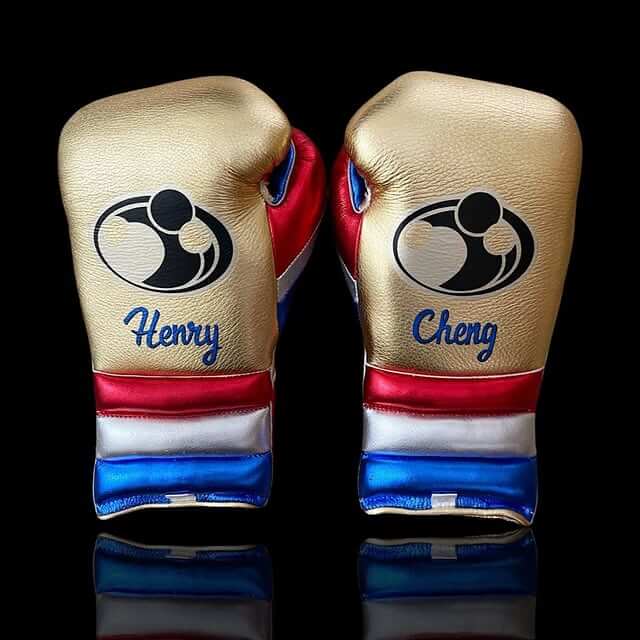 Grant Boxing Gloves in Gold/Blue/Red colorway - Professional Lace-Up training gloves