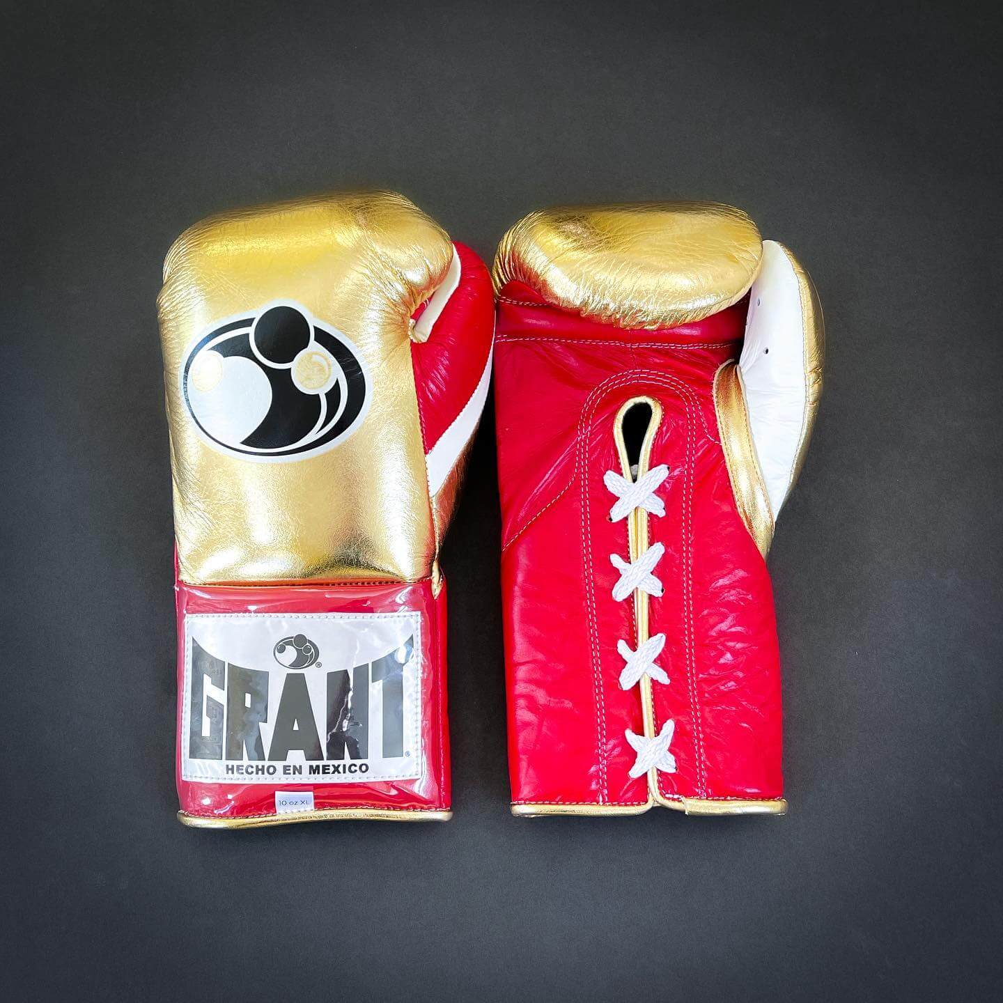 Grant Boxing Gloves in Gold/Red/White colorway - Professional Lace-Up training gloves