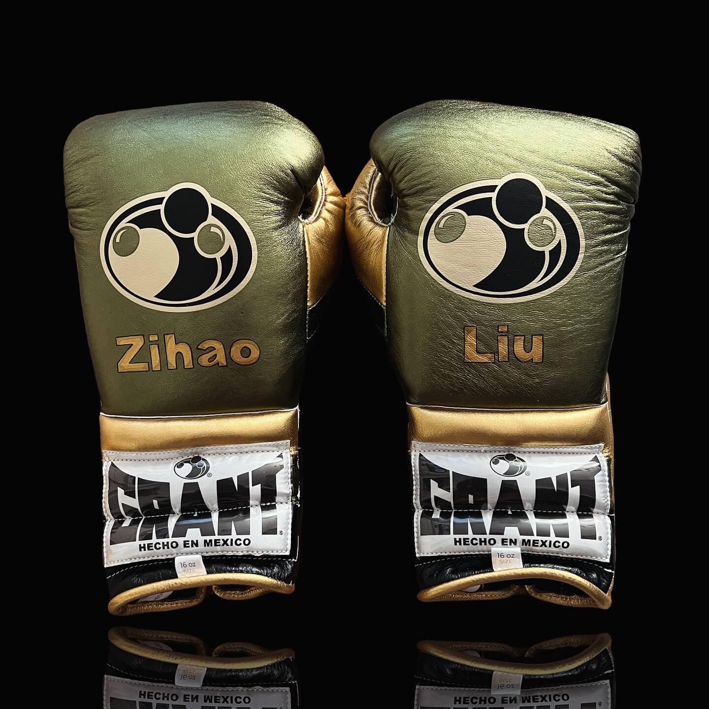 Grant Boxing Gloves in Green/Black/Gold colorway - Professional Lace-Up training gloves