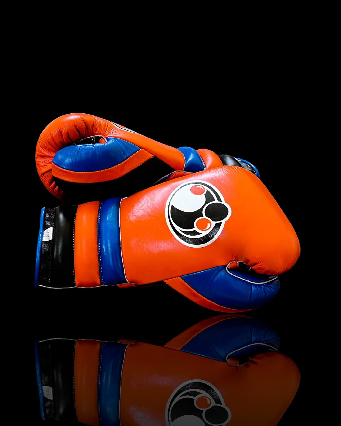 Grant Boxing Gloves in Orange/Black/Blue colorway - Professional Lace-Up training gloves
