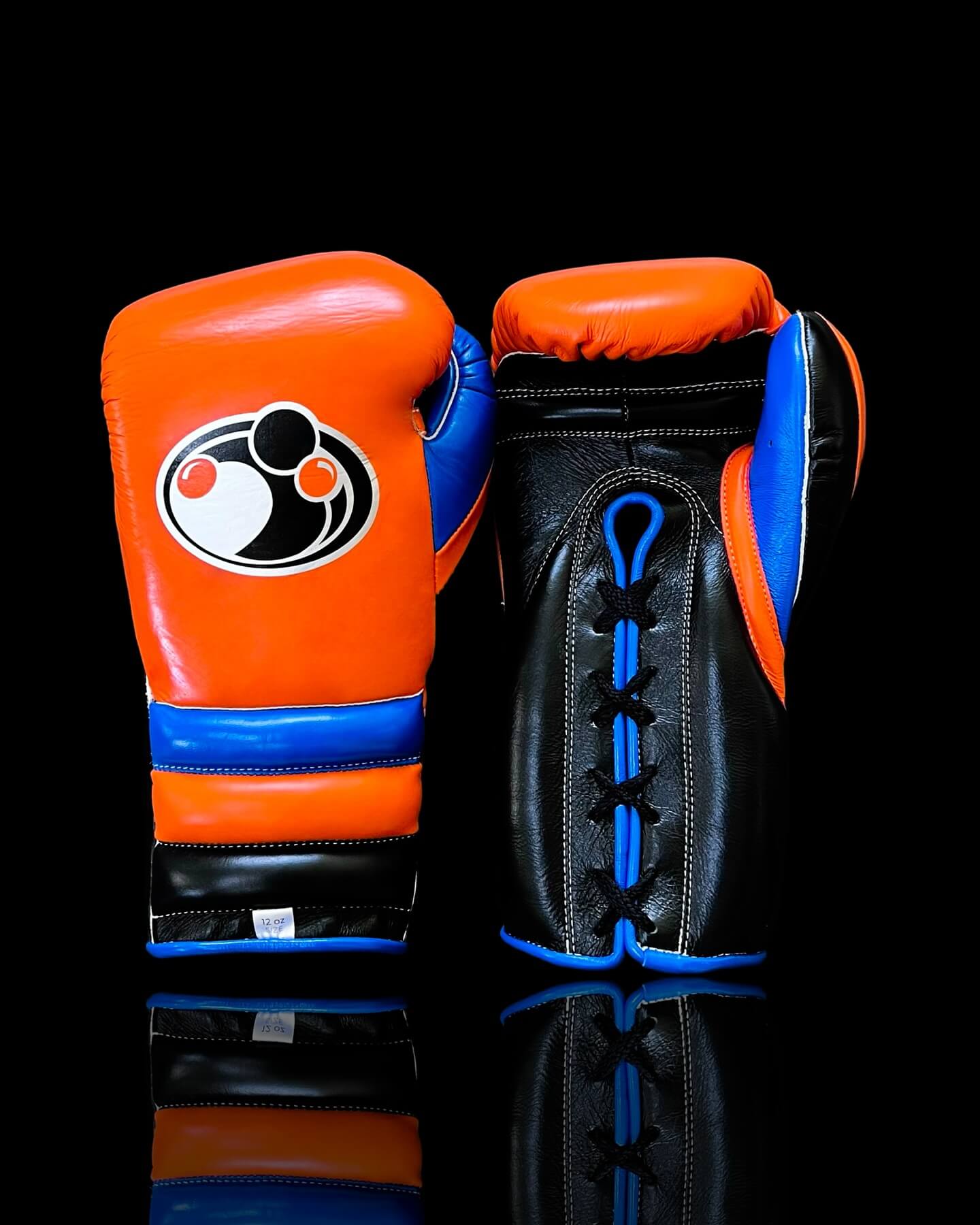 Grant Boxing Gloves in Orange/Black/Blue colorway - Professional Lace-Up training gloves
