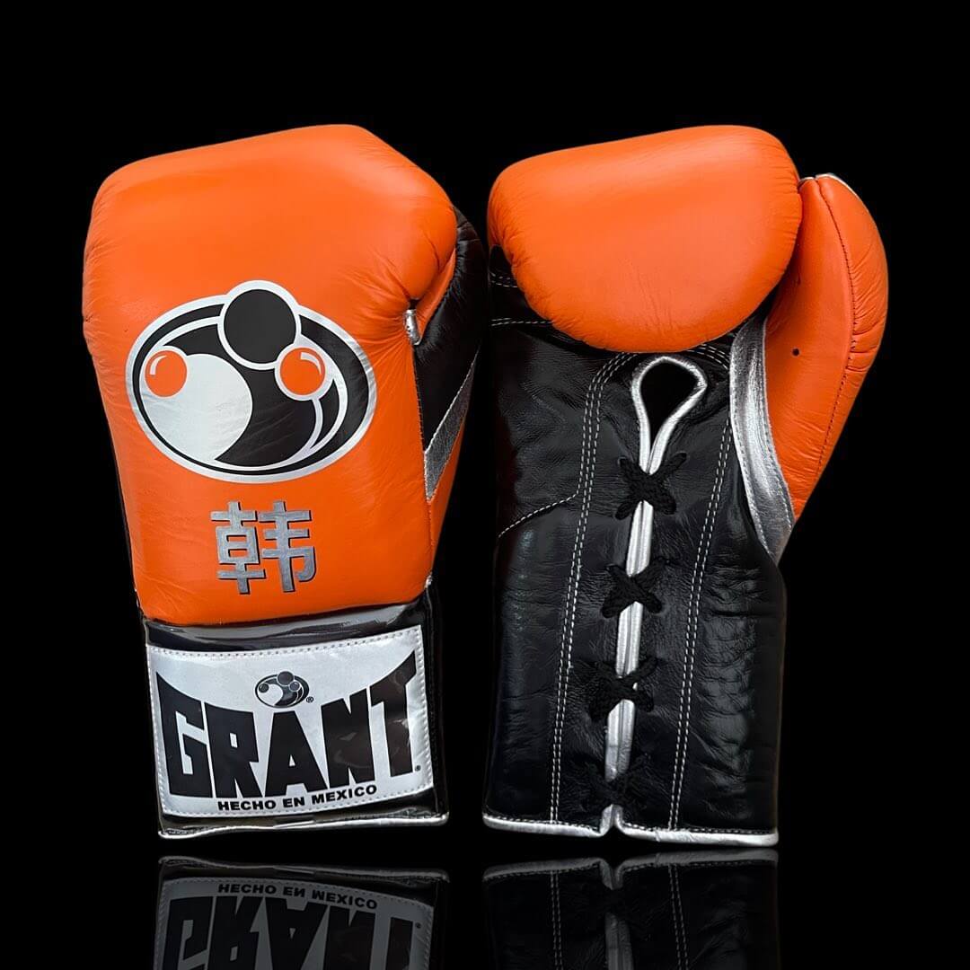 Grant Boxing Gloves in Orange/Black/Silver colorway - Professional Lace-Up training gloves