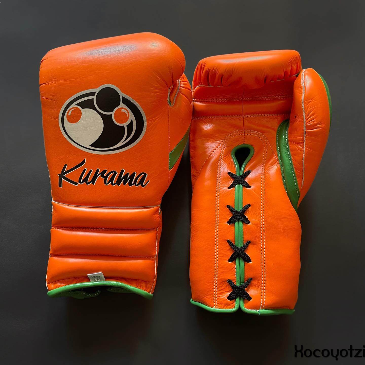 Grant Boxing Gloves in Orange/Green colorway - Professional Lace-Up training gloves