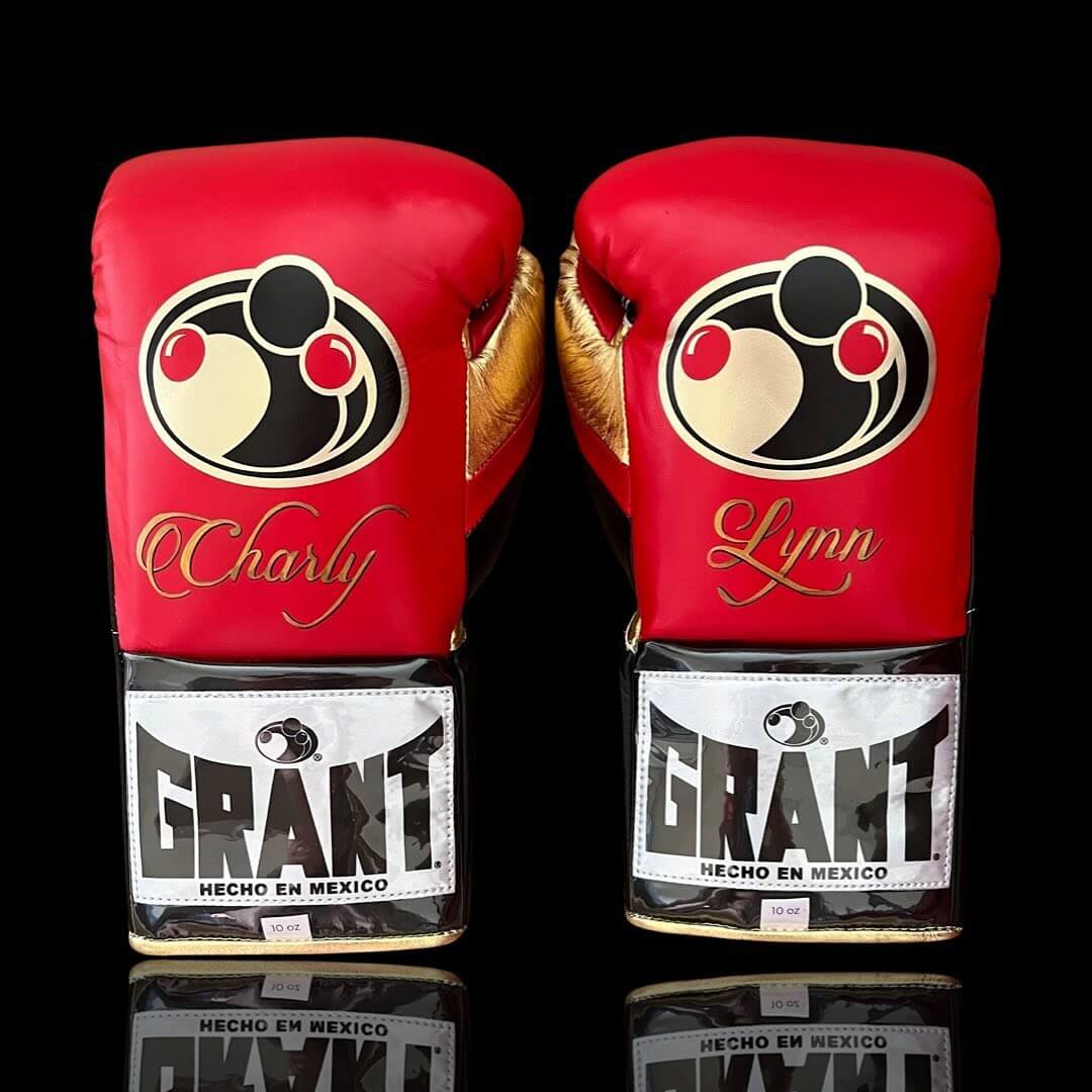 Grant Boxing Gloves in Red/Black/Gold colorway - Professional Lace-Up training gloves