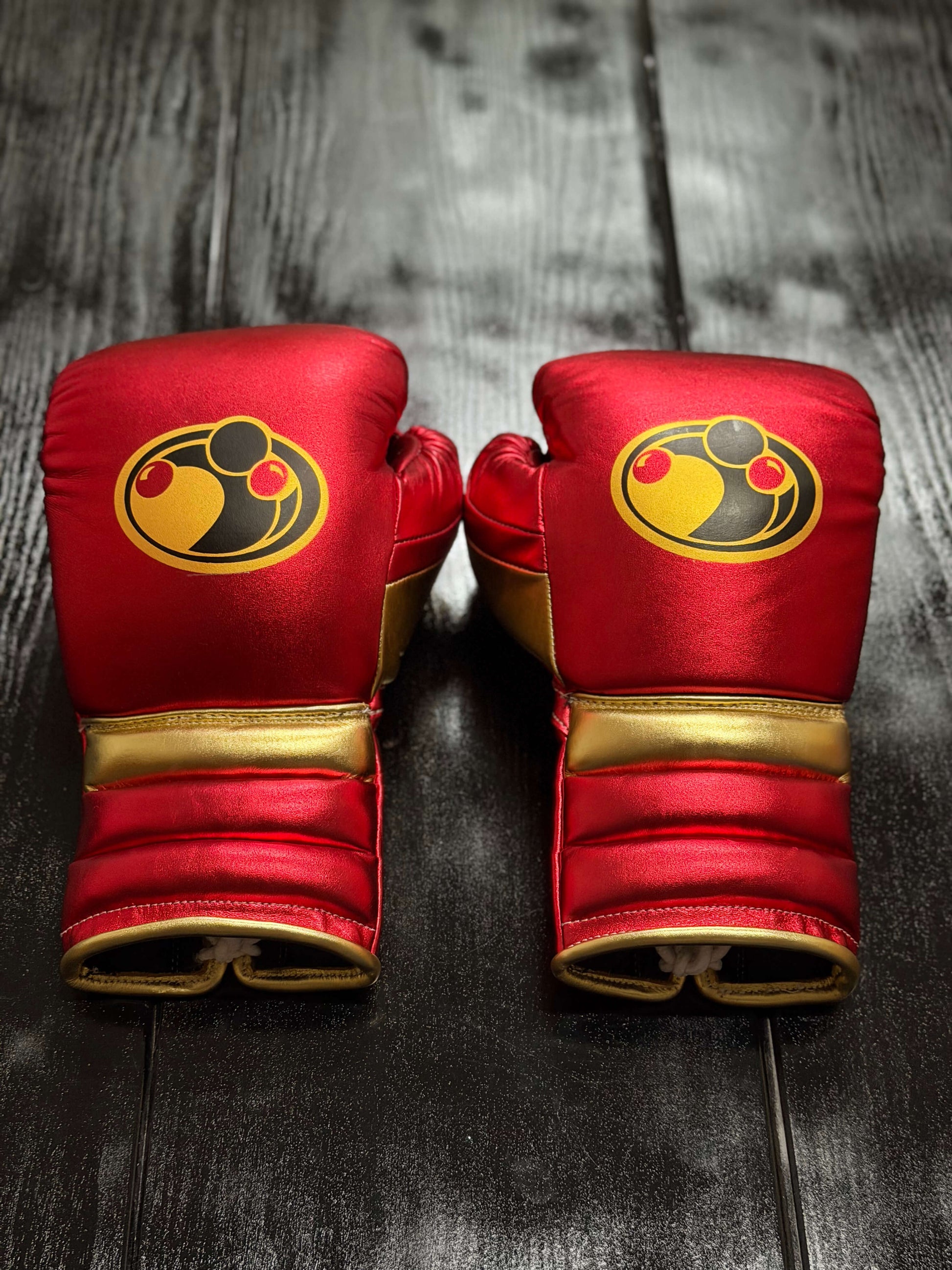 Grant Boxing Gloves in Red/Gold colorway - Professional Lace-Up training gloves