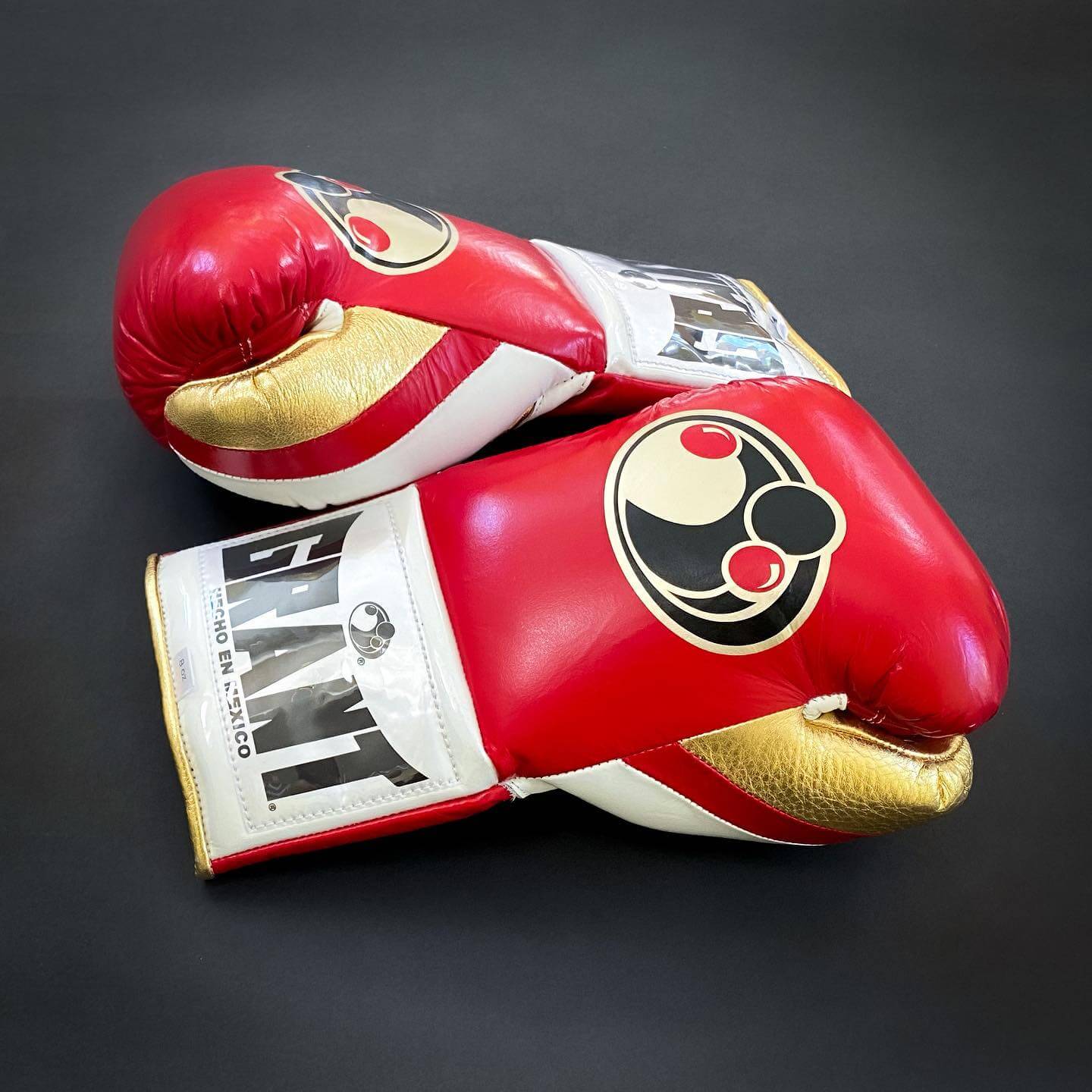 Grant Boxing Gloves in Red/White/Gold colorway - Professional Lace-Up training gloves