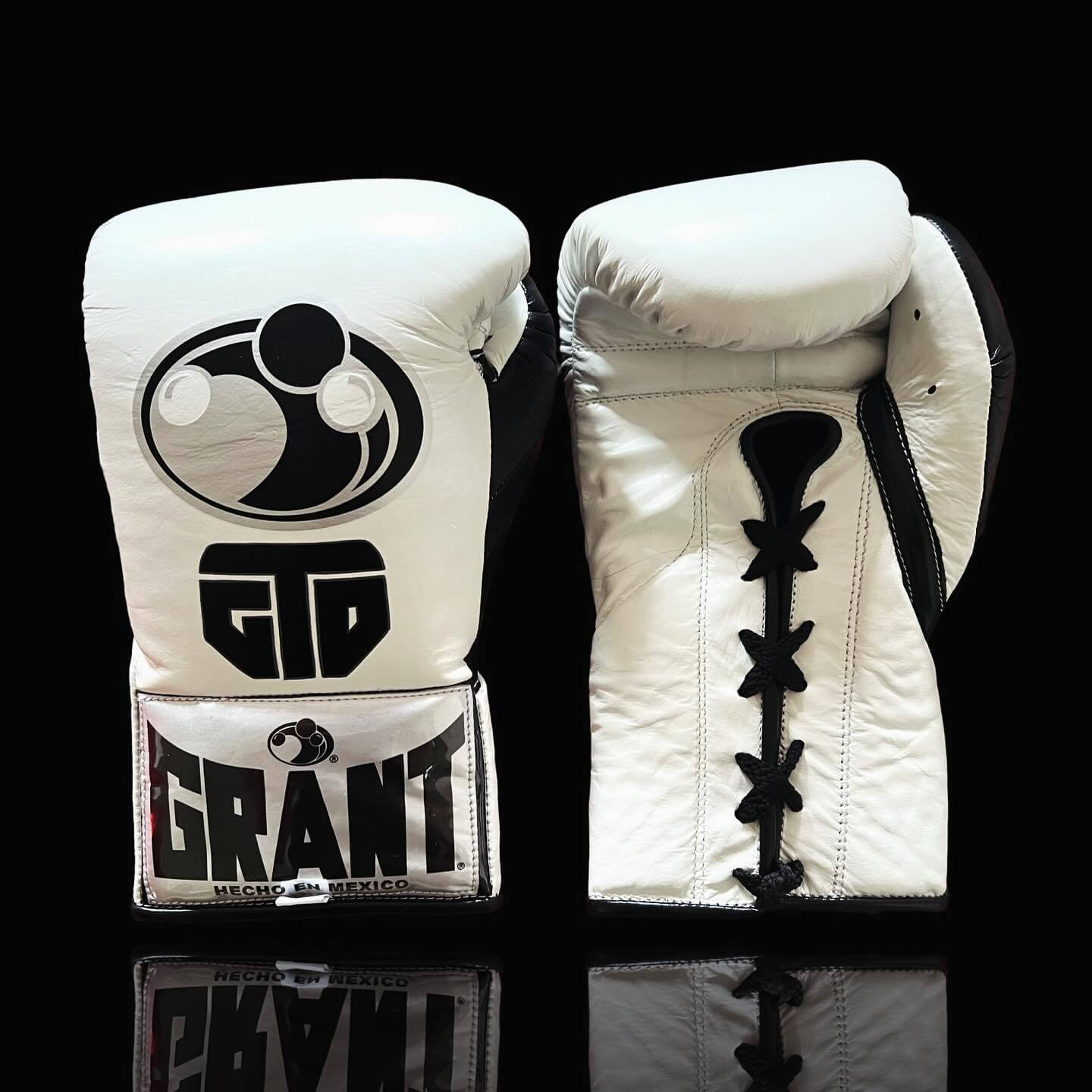 Grant Boxing Gloves in White/Black colorway - Professional Lace-Up training gloves