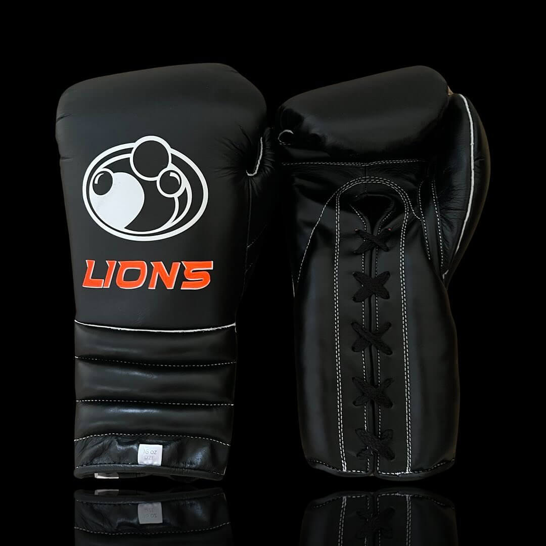 Grant Boxing Gloves in Black/Orange colorway - Professional Lace-Up training gloves