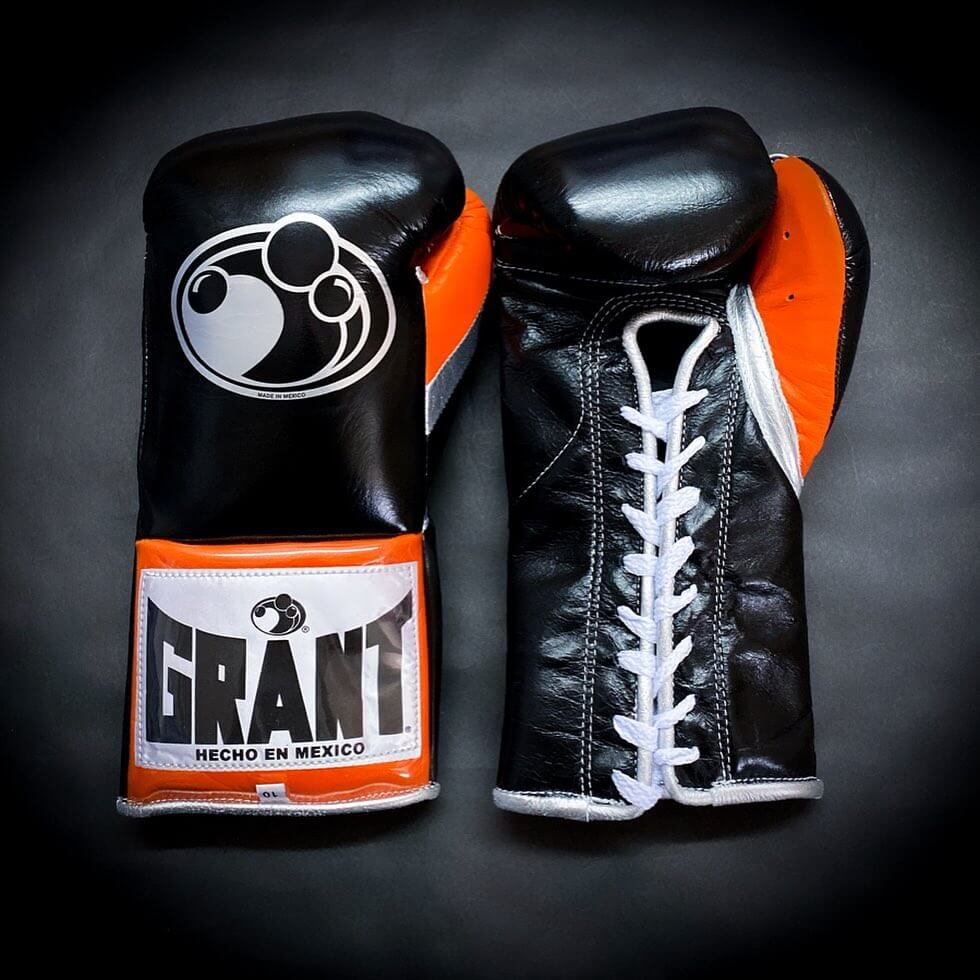 Grant Boxing Gloves in Black/Red/White colorway - Professional Lace-Up training gloves