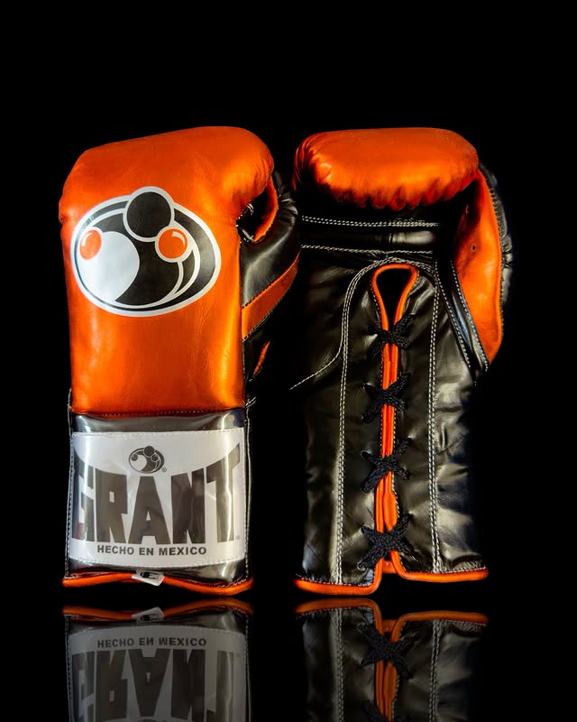 Grant Boxing Gloves in Orange/Black colorway - Professional Lace-Up training gloves