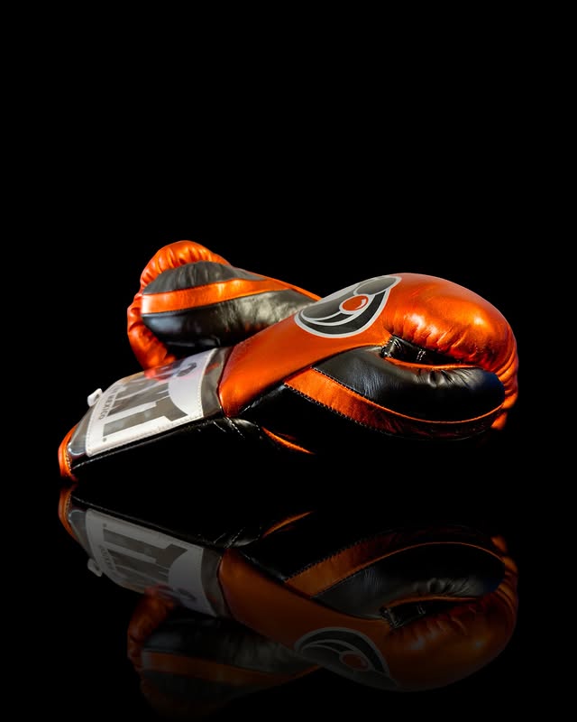 Grant Boxing Gloves in Orange/Black colorway - Professional Lace-Up training gloves