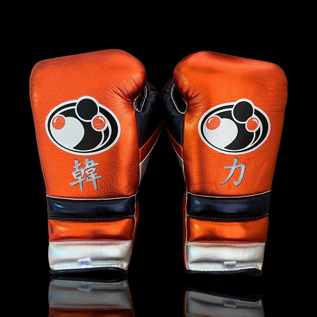 Grant Boxing Gloves in Orange/Grey/Silver colorway - Professional Lace-Up training gloves